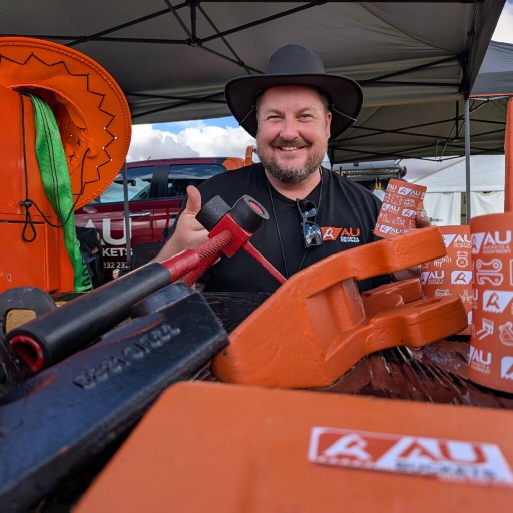 AUBuckets team wearing new hats at the Mullewa Muster stall - AU Buckets | Excavator Buckets, Attachments, Heavy Equipment Hire and Wear Parts AUBuckets truck with a flat tyre on the way to Mullewa