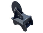 Industrial capstan-style winch with a large black flywheel mounted on a metal frame, used to reel in or payout cable or rope.