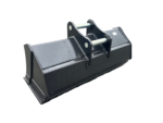 Large steel excavator bucket attachment with mounting pins, resting on a concrete surface in an industrial yard.