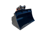Large black front-end loader bucket, detached, in a storage yard with other buckets in the background.