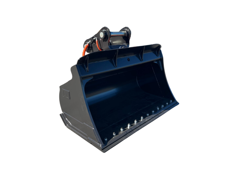 Large black front-end loader bucket, detached, in a storage yard with other buckets in the background.