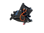 Hydraulic grapple attachment in black with orange hoses, used to grab and lift debris on heavy machinery.