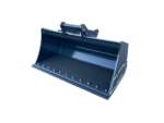 Heavy steel excavator bucket attachment on a paved lot, showing the mounting bracket and reinforced cutting edge with bolts along the bottom edge.