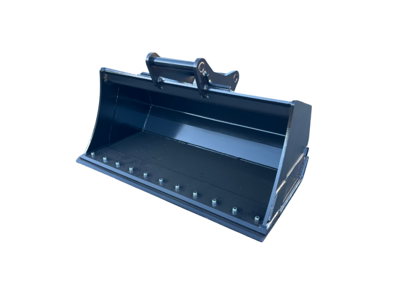 Heavy steel excavator bucket attachment on a paved lot, showing the mounting bracket and reinforced cutting edge with bolts along the bottom edge.